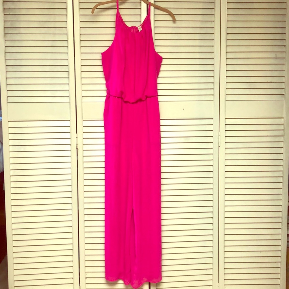 Fuchsia pink short sleeve romper with pockets